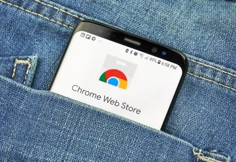 Chrome Web Store on a phone screen in a pocket Фото