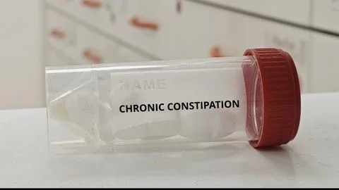 CHRONIC CONSTIPATION treatment tablets for relieve long term constipation and Stock Photos