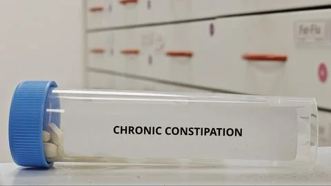 CHRONIC CONSTIPATION treatment tablets for relieve long term constipation and Stock Photos