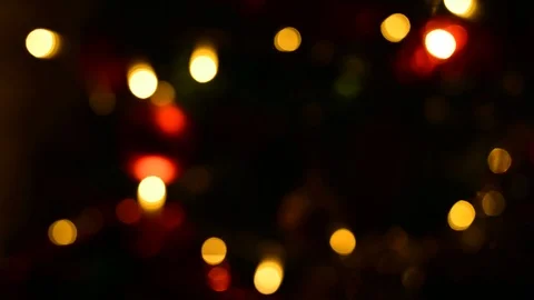 Chrstmas lights and red bulbs on a christmass tree w Stock Footage 119007481