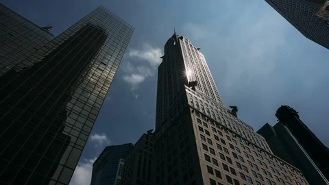 Chrysler Building viewed from low angle with clouds Stock Footage 114079552
