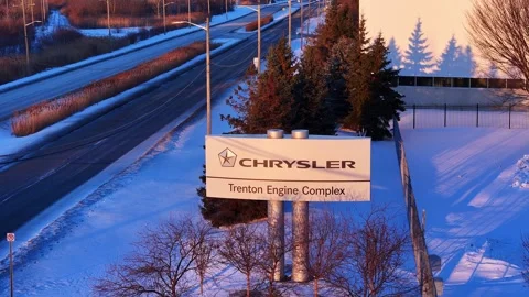 Chrysler Trenton Engine Complex sign standing by road in winter in aerial view Stock Footage 333895423