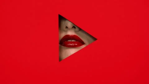 Chubby girl lips in triangular hole red paper Stock Footage 86567203