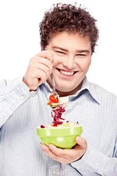Chubby man and salad Stock Photos