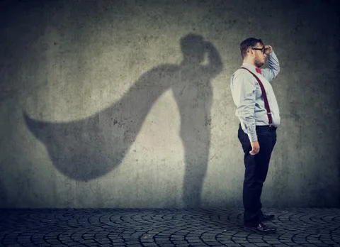 Chubby man posing as super hero Stock Photos