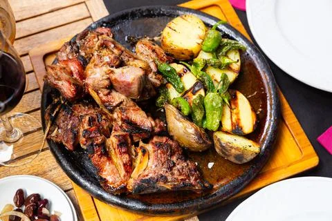 Chuleton is a popular Spanish dish made from a beef steak Stock Photos