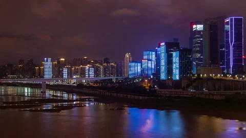 Chungking reflected in calm Jialing river in China timelapse Video stock 121904010