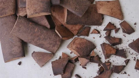 Chunk of cacoa mass bar or cocoa liquor. Stock Footage 311921241