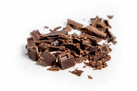 Chunks of dark chocolate separated on a white background.Small chunks of ch.. Stock Photos