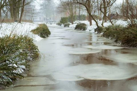 Chunks of ice in a small canal Stock Photos