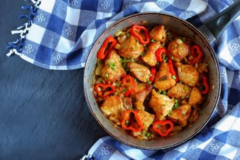 Chunks of  pork fried with onion Stock Photos
