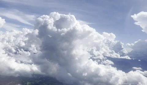 Chunky clouds as seen from a plane's window Stock Footage 232341600