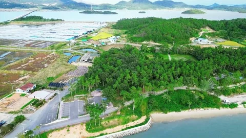 Chupodo Island Reverse Flight Over Sea 4K Drone Cinematic Sinan gun Jeollanam do Stock Footage 326373131