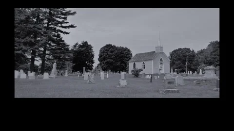 A church and graveyard Stock Footage 277778825