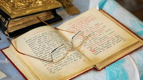 Church attribute. the open Bible and glasses. Stock Footage 75073729