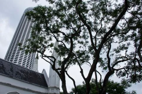 Church Backdrop over cloudy sky conveying a moody feel Stock Photos