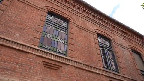 Church Building with red bricks and mosaic pattern window Stock Footage 248831008