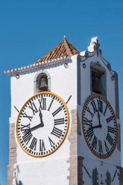 Church clock tower in Tavira, Portugal Stock Photos