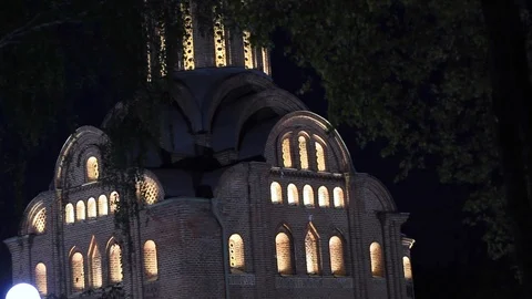 Church in the evening with luminous windows Video stock 98489200