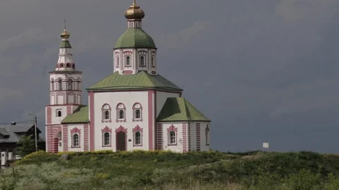 Church on the hill on a background of a cloudy sky and river. Ilyinskaya church Stock Footage 90909696
