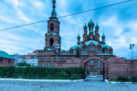 Church of the Holy Trinity on the background of the cloudy sky. Stock Photos