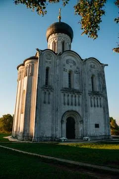 The Church of the Intercession of the Holy Virgin on the Nerl River at dawn Stock Photos