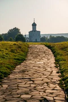 The Church of the Intercession of the Holy Virgin on the Nerl River at dawn Stock Photos
