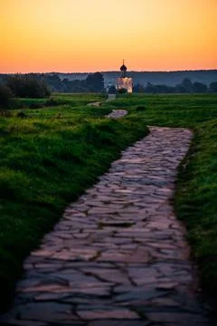 The Church of the Intercession of the Holy Virgin on the Nerl River at dawn Stock Photos