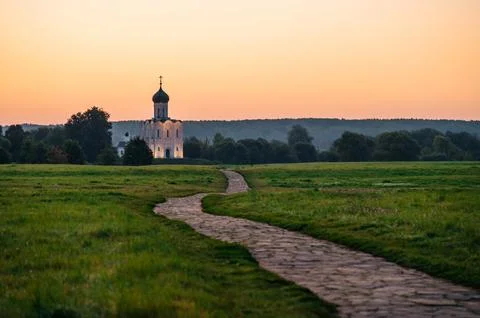 The Church of the Intercession of the Holy Virgin on the Nerl River at dawn Stock Photos