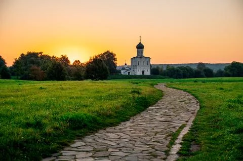 The Church of the Intercession of the Holy Virgin on the Nerl River at dawn Stock Photos