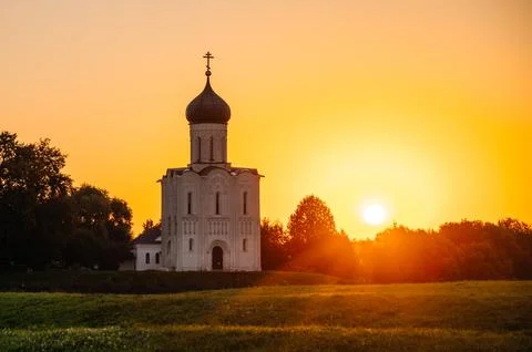 The Church of the Intercession of the Holy Virgin on the Nerl River at dawn Stock Photos