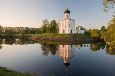 Church of Intercession on the Nerl in the evening, at sunset Stock Photos