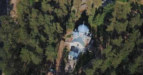 Church in a middle of the pine forest during the golden hour. Video stock 124865678