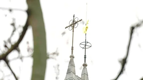 Church spire with tree branch foreground Vídeo Stock 340972173