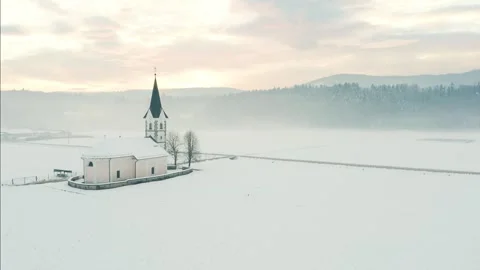 Church Standing in Middle Of Fields On Winter Morning. Fields Covered In Snow. Stock Footage 250416328