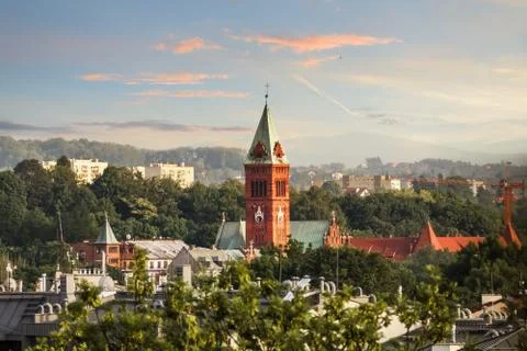 The church tower on the background of dramatic sky. Krakow. Stock Photos