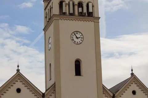 Church tower with clock against cloudy sky Stock Photos