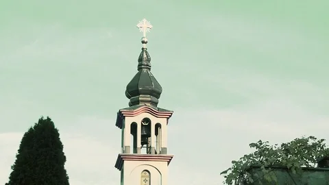 A church tower with a cross 스톡 동영상 86769422