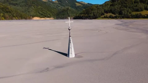 Church Tower Emerging from Mining Waste Stock Footage 328830014