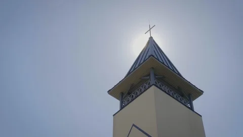 Church Tower Revealed in Sun Stock Footage 101784029