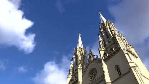 Church Towers And Cloudscape in Time Lapse Stockbeeldmateriaal 84765958