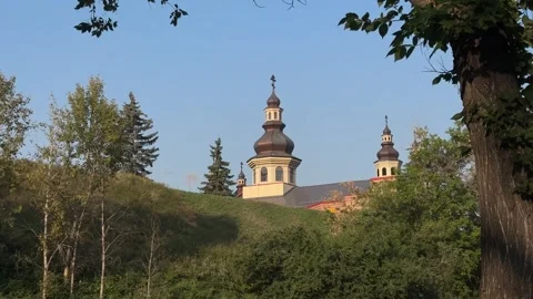 Church towers behind the hill Orthodox Summer mid day Vídeo Stock 345100853