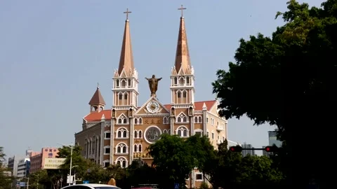 A church at a traffic intersection Stock Footage 234998257