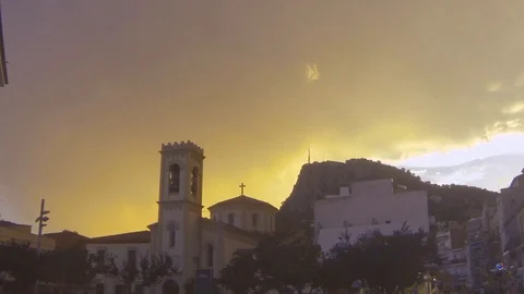 Church under a very cloudy and menacing sky Stock Footage 104306151