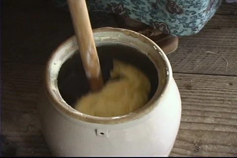 Churning Homemade Butter Stock Footage
