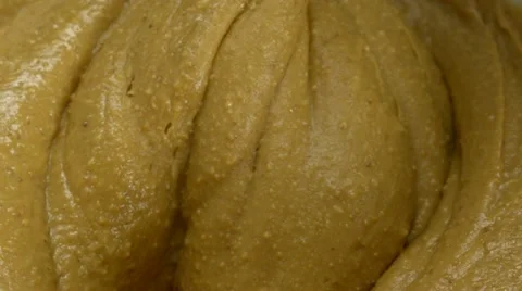 Churning peanut butter, Slow Motion Stock Footage