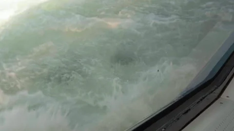 Churning sea waves viewed from a ferry window Stock Footage 296083206