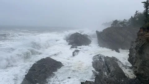 Churning seas and waves of the Pacific Ocean on the Oregon Coast Stock Footage 329448786