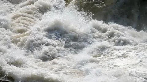 Churning white water at base of waterfall Stock Footage 10746574