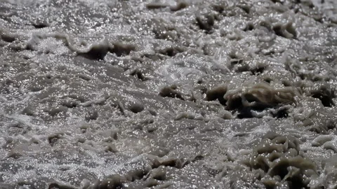Churning white water river rapids in close-up, highlighting the raw power of Stock Footage 265489352